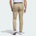 Adi_Advantage_Tapered_Golf_Pants_Beige_IU2826_23_hover_model.webp